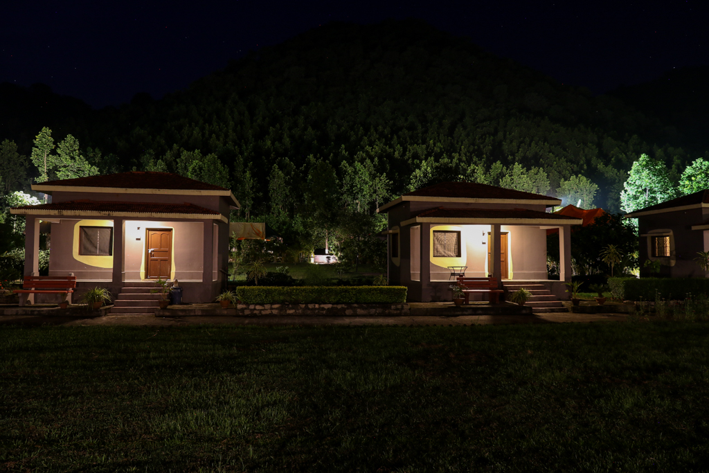 Khairabera eco adventure resort cottages at night